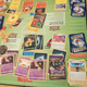 A busy PTCG game with cards and counters all over the board.